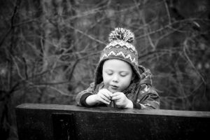 black and white photo of boy