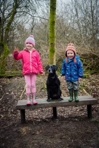 kids standing on bench