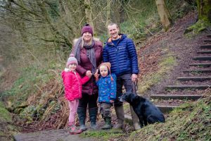 family looking at camera