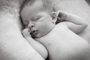 Newborn baby close up in black and white