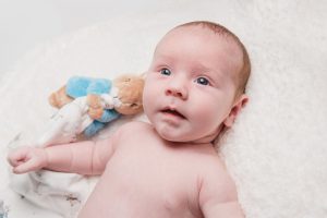 baby on fluffy rug