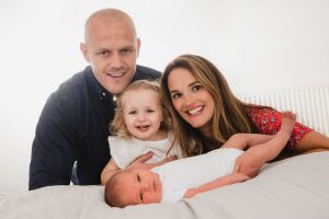 image of newborn baby and family