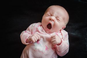 baby captured yawning