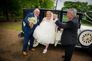 bride gets out of the car