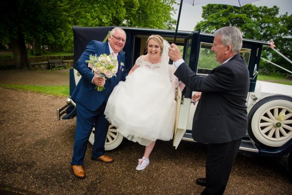 bride gets out of the car