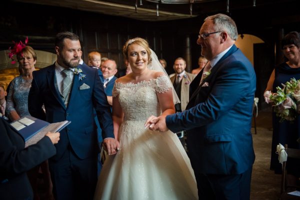 dad gives bride away