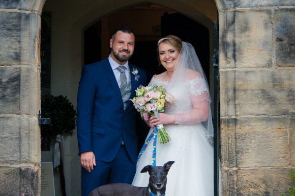 bride and groom and dog
