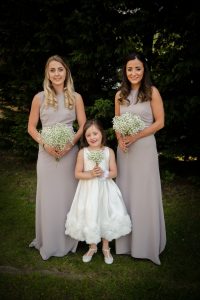 The bridesmaids pose for the camera