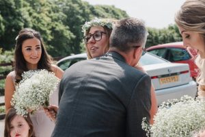 bride gets a hug