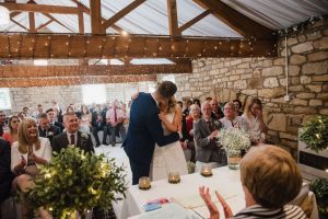 first kiss as newlyweds