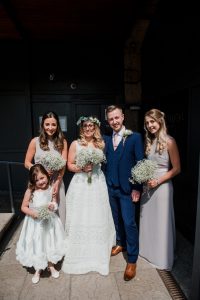 bridal party straight out of the ceremony