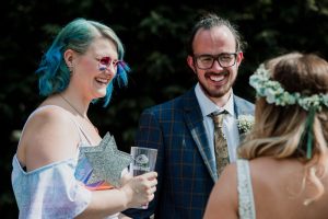 guests at the wedding laughing