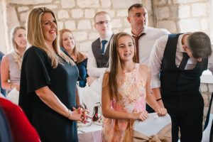 guests cheer the newlyweds