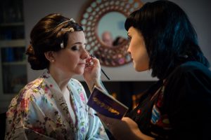bride has makeup applied