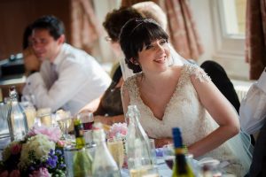 bride laughing with the guests