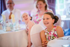 flower girls laugh at the speeches