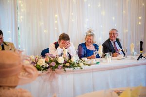embarrassed groom during speeches