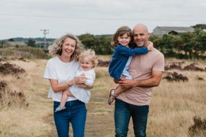 family looking at camera