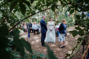Framed by trees at Trafford Hall wedding
