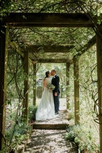 bridal portrait framed in garden