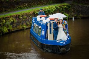 couple go out on canal barge boat