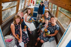 bridal party pose on boat