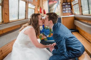 couple kiss on boat