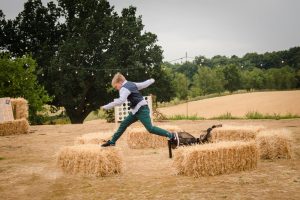 kids play on hay bales