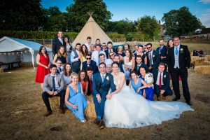 group photo at tipi wedding