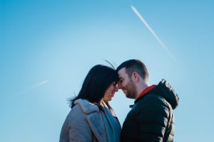 couple against blue sky