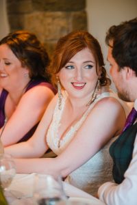 bride looks at groom