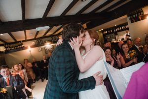 first kiss of the newlyweds