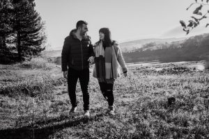 couple go for a walk black and white