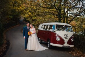 Bride and groom with camper van
