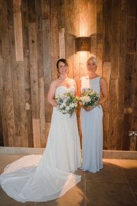 bride and sister before the ceremony