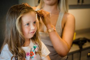 flower girl getting ready