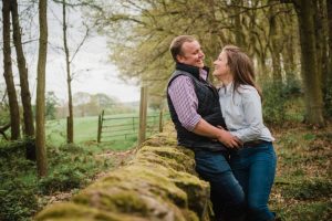 landscape photo with engaged couple