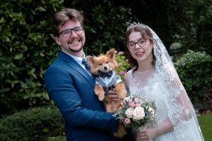 bride and groom and dog