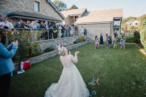 bride throws the nfl ball