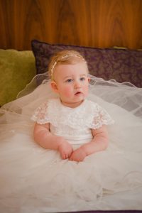 Baby flower girl in beautiful dress