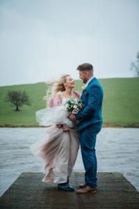 newlyweds by the lake at Coniston hOtel