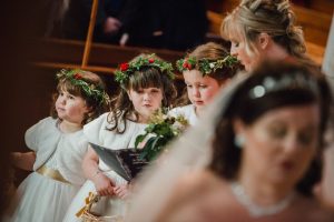 flower girls sing in the church