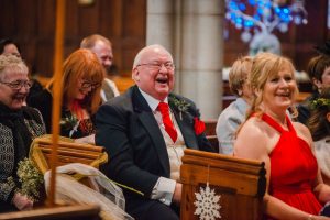 dad laughs during wedding