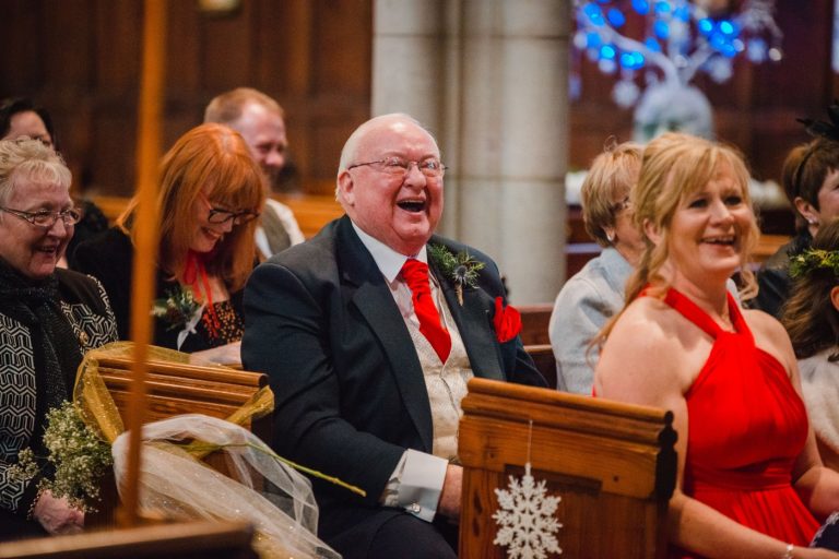 dad laughs during wedding