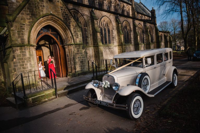 car arrives at the church in marsden