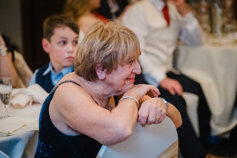 guests laugh at speeches
