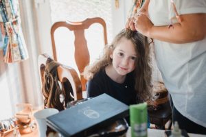 flower girl getting ready