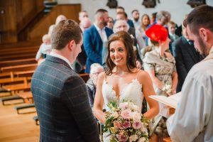 bride and groom in the aisle