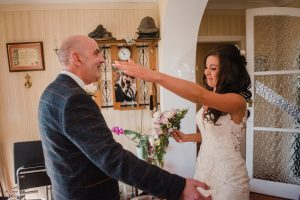 bride and dad emotional before wedding first look
