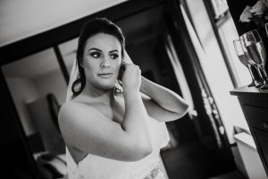 black and white of bride on the morning of wedding